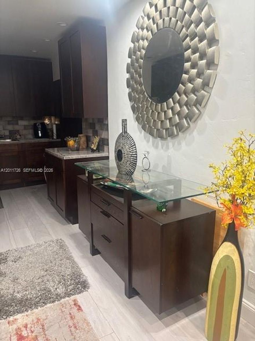 Modern upgrades, beautiful large kitchen cabinets, splash and upgrade appliances. Modern light fixtures, new roof. Laundry room, updated bathroom. No updates required. Move in ready.