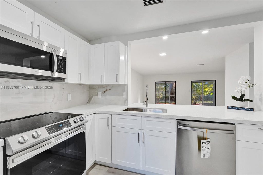 Photo of 856 NW 47th St #856, Deerfield Beach, FL 33064 (MLS # A11833766)