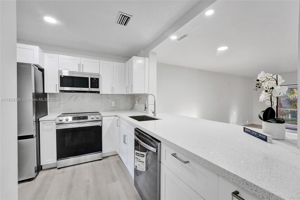Photo of 856 NW 47th St #856, Deerfield Beach, FL 33064 (MLS # A11833766)