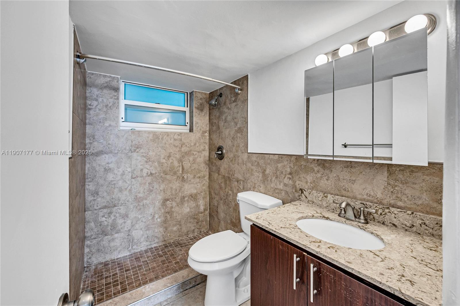 COLLINS MANOR CONDO - Residential Lease