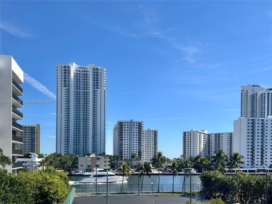TOP VALUE at Ocean View Park Condo!  CAN BE RENTED right after purchase.   COME SEE IT NOW !!    
Spacious 1 Bedroom & Large Den. 1.5 Bathrooms. Newer AC. WATER VIEW. Waterfront pool and amenities. 24hr Security/Front Desk. Located in the gated, walking-friendly community of Three Islands. Perfect location.    DON'T MISS OUT on this opportunity!