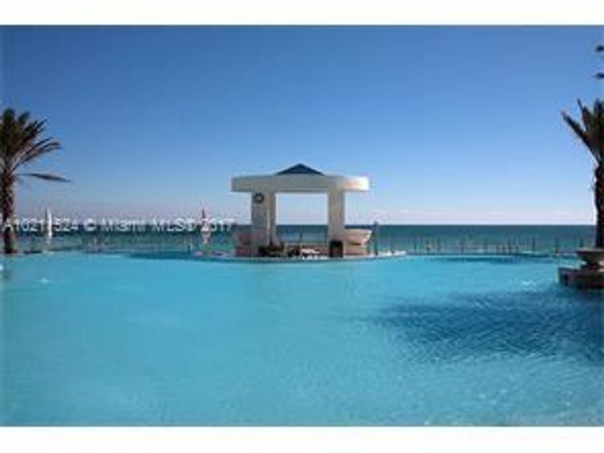 SPACIOUS, 26TH FLOOR 3BED, 3.5 BATH RESIDENCE WITH SPECTACULAR OCEAN AND BEACH VIEWS!.  STEP OFF A PRIVATE ELEVATOR THROUGH DOUBLE DOORS INTO A LARGE FLOW-THRU HOME IN THE SKY WITH 2 BALCONIES, FLOOR TO CEILING WINDOWS, GRANITE COUNTERS, ITALIAN CABINETRY, JACUZZI, FRAMELESS SHOWER, CUSTOM BUILT CLOSETS.  5 STAR AMENITIES INCLUDE: 2 STORY GYM, TENNIS COURT, THEATER ROOM, SAUNA, BILLIARDS, PARTY ROOM, CONFERENCE ROOM, BUSINESS CENTER, POOL AND BEACH SERVICE, 24 HRS SECURITY, VALET & MORE! PURE LUXURY!