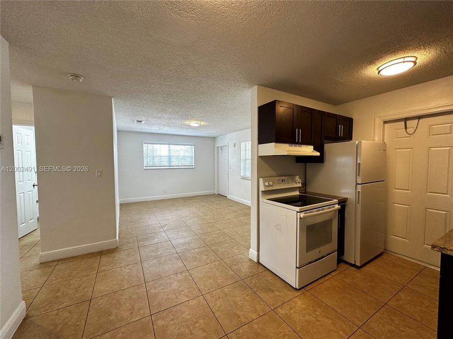 SPACIOUS, newly upgraded 2-bedroom/1-bath in Pompano Beach!!! Charming 2nd floor, corner unit with beautiful tile floors, granite countertops, wooden cabinets, impact windows, central AC. Large living and dining room area with full kitchen and upgraded appliances. Unit features an abundant of natural light and several closets for ample storage. Located in a gorgeous, well-maintained, gated complex with plenty of amenities: sun deck, garden area, BBQ / picnic area, community pool & full laundry room on-site. Private community with security patrol. Water, waste, sewer, maintenance, pest control + 1 assigned parking space included. Pets welcome with 1x pet fee. Property is in a great area - centrally located, tucked away on a quiet street in a pretty neighborhood yet close to all of the major highways, shops, restaurants, schools & parks.