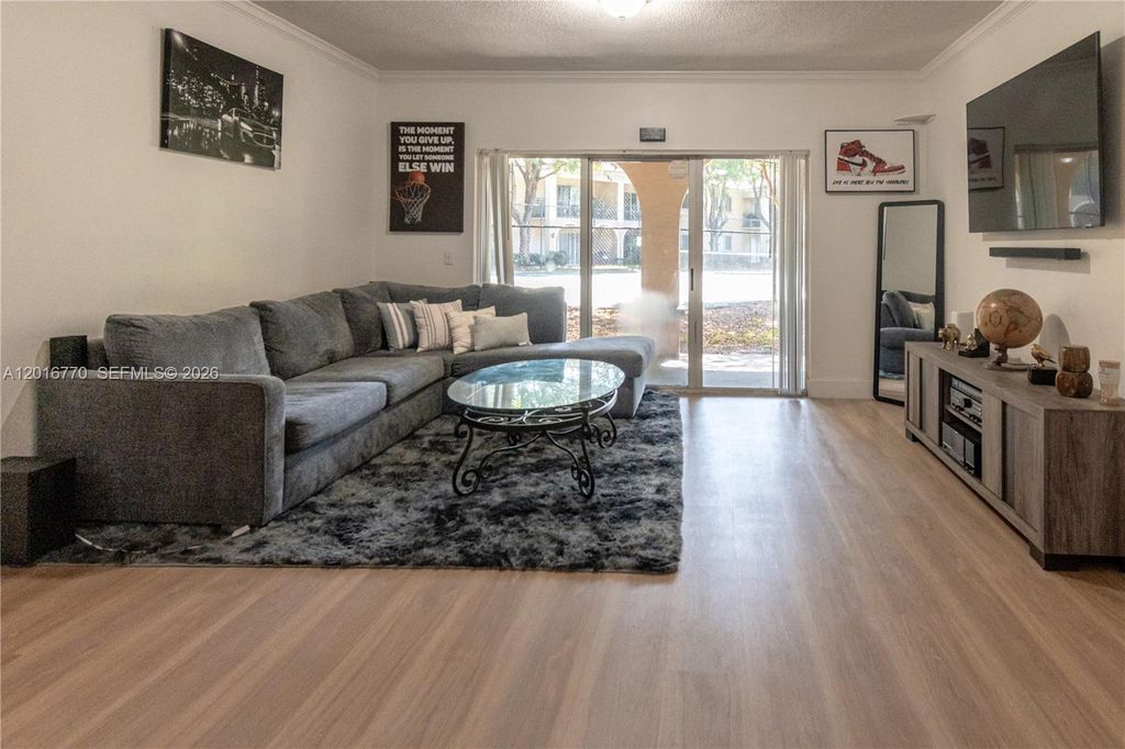 Photo of 2482 Centergate Dr #104, Miramar, FL 33025 (MLS # A12016770)