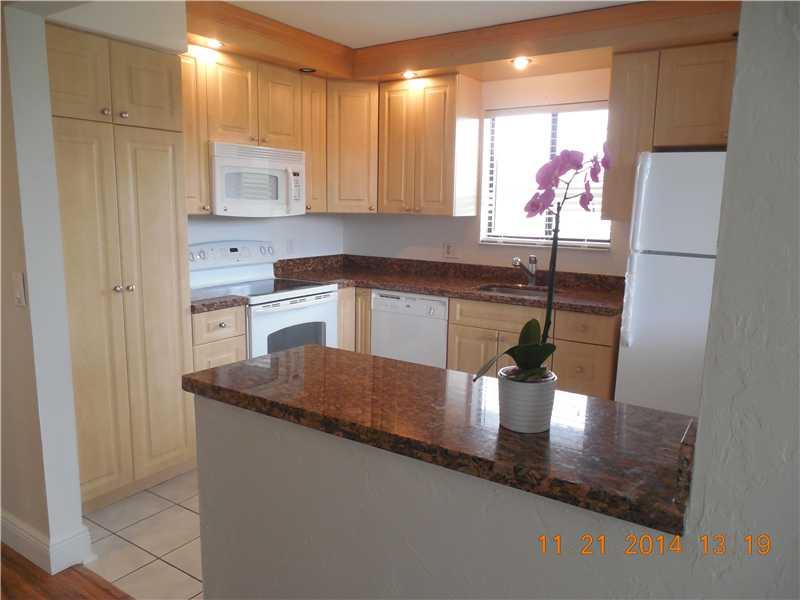 AS IS...Absolutely Gorgeous!! 2 bedroom 2 baths,second corner unit, Relax in your porch over looking the garden and water. This unit has it all!! laminated floors throughout with large bedrooms , beautiful kitchen with granite counters and a breakfast bar. Upgrades in both bathrooms. Enjoy the Bonaventure Club House..Best school in Broward County. This unit has it all!!!