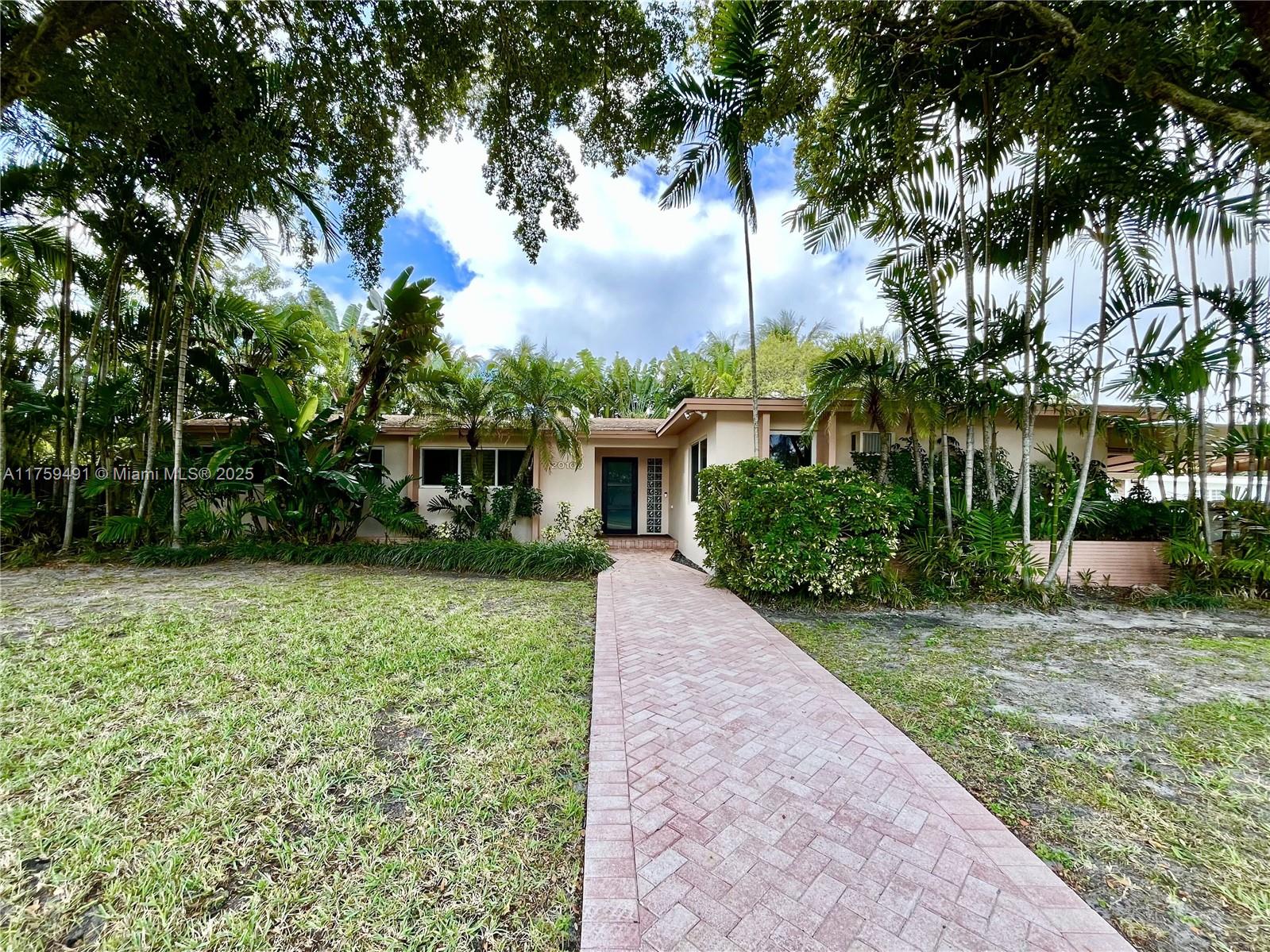 Exquisite Corner Lot Home in Oak Forest Gated Community with two guarded gates and 24/7 Miami-Dade County. Beautiful tropical landscaping. The spacious corner lot includes a 3-car carport, new roof (2018), and a pool area renovated in 2018 with a paver deck, landscaping, and a fenced yard. Hurricane impact windows and accordion shutters ensure peace of mind.
Inside, custom wood kitchen cabinets, quartz countertops, high-end appliances, and marble floors throughout. The home also features custom closet systems and an irrigation system with clean well water.
Conveniently located near Aventura Mall, the JCC, Hillel, temples, churches, shopping, and I-95, shopping, and top-rated schools.