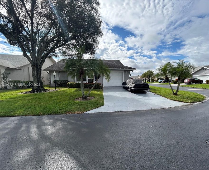 Recently Reduced Price! Don’t miss this incredible opportunity! Welcome to this well-maintained home in the highly sought-after Cypress Lakes community in West Palm Beach! Ideally located within this vibrant 55+ neighborhood, residents enjoy an active lifestyle with amenities for everyone, including an 18-hole golf course, tennis, pickleball, bocce ball, shuffleboard, water aerobics, yoga, and much more.

Situated on a desirable corner lot, this spacious two-bedroom, two-bathroom home offers comfort and versatility throughout. Very large Master bedroom with its own en suite bath. You’ll find abundant natural light throughout the home, high vaulted ceilings, recessed high-hat lighting, and tile flooring throughout. The thoughtfully designed and spacious layout includes an inviting foyer, large living room, dining area, and a flexible family room/den area. Additionally the home has a one-car garage with a woodworking space, an enclosed patio, outdoor patio, screened in front porch and a Florida room all enhancing the already expansive feel of this property. Recent updates include a freshly painted exterior, a new washer and dryer, and a newer central air conditioning system. Hurricane shutters also offer added peace of mind.

A rare opportunity in the community, this property is one of the few that allow immediate rental if desired, making it a great additional option for homeowners. Don’t miss this excellent opportunity to own a beautiful home ready for its next owner!