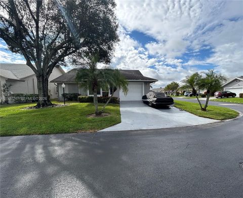 Photo of 5275 Tiffany Anne Cir, West Palm Beach, FL 33417 (MLS # A11927247)