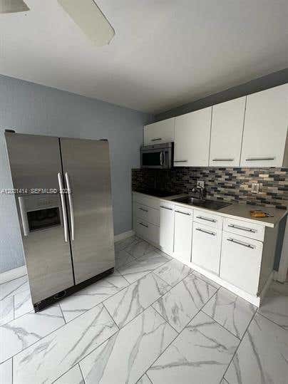 Photo of 3251 SW 44th St #201, Dania Beach, FL 33312 (MLS # A12031414)