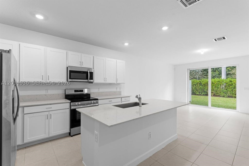 Photo of 4667 Hollister Ave, Lake Worth, FL 33463 (MLS # A12091936)