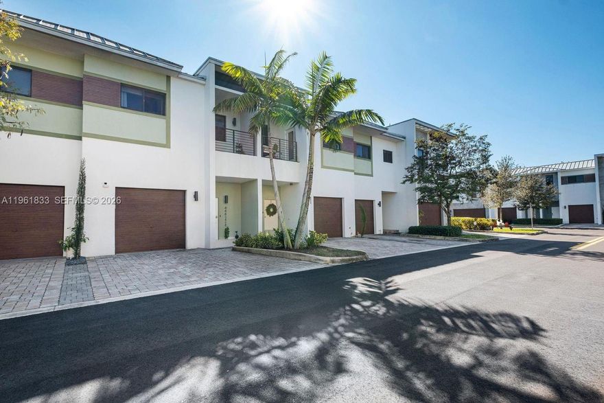 Welcome to Strata! A contemporary residence with a European-style kitchen, spacious primary suite with private balcony, and spa-like bathrooms. One of the largest floor plans in the community, featuring high ceilings (12 ft first level, 9 ft upstairs), porcelain tile flooring, and a modern designer backsplash. Located in a gated community with on-site security and resort-style amenities including a fitness center, pool, clubhouse, dog park, and playground. Prime location near, shopping, dining, and groceries, with easy access to Downtown Fort Lauderdale, Nova Southeastern University, and American Heritage School. A standout opportunity to enjoy stylish living with everyday convenience in a prime location. Wonderful opportunity for first time homebuyers or investors alike.