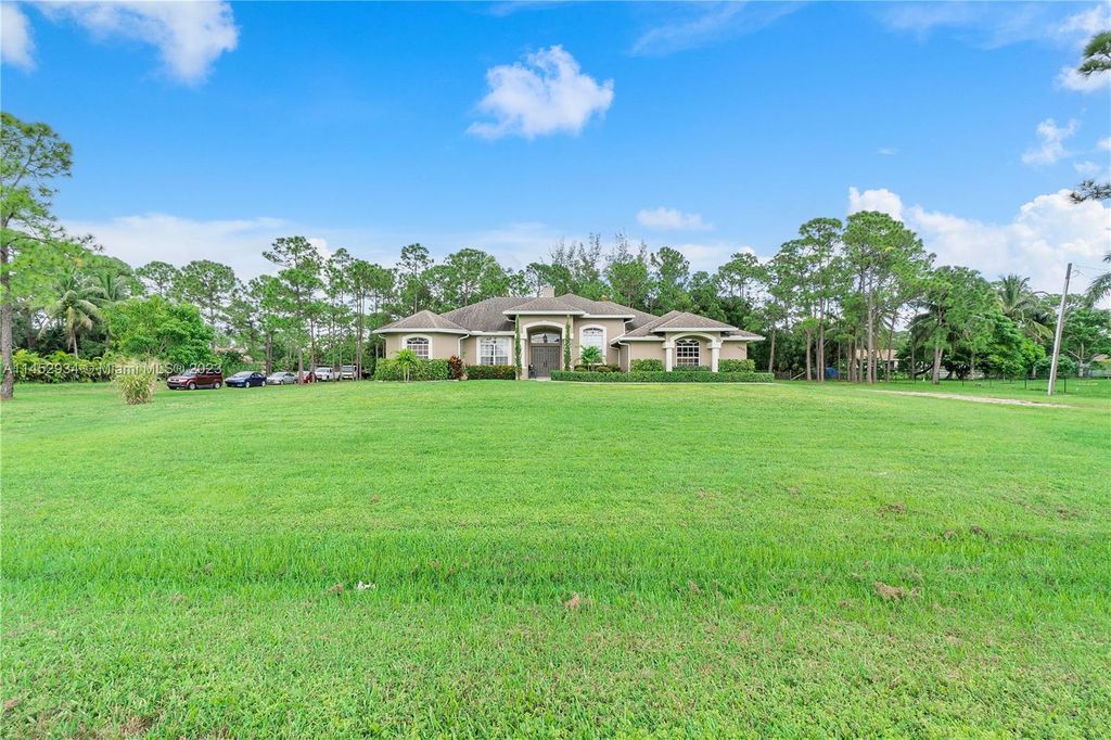 Photo of 15251 Tangerine Blvd, Loxahatchee, FL 33470 (MLS # A11452934)