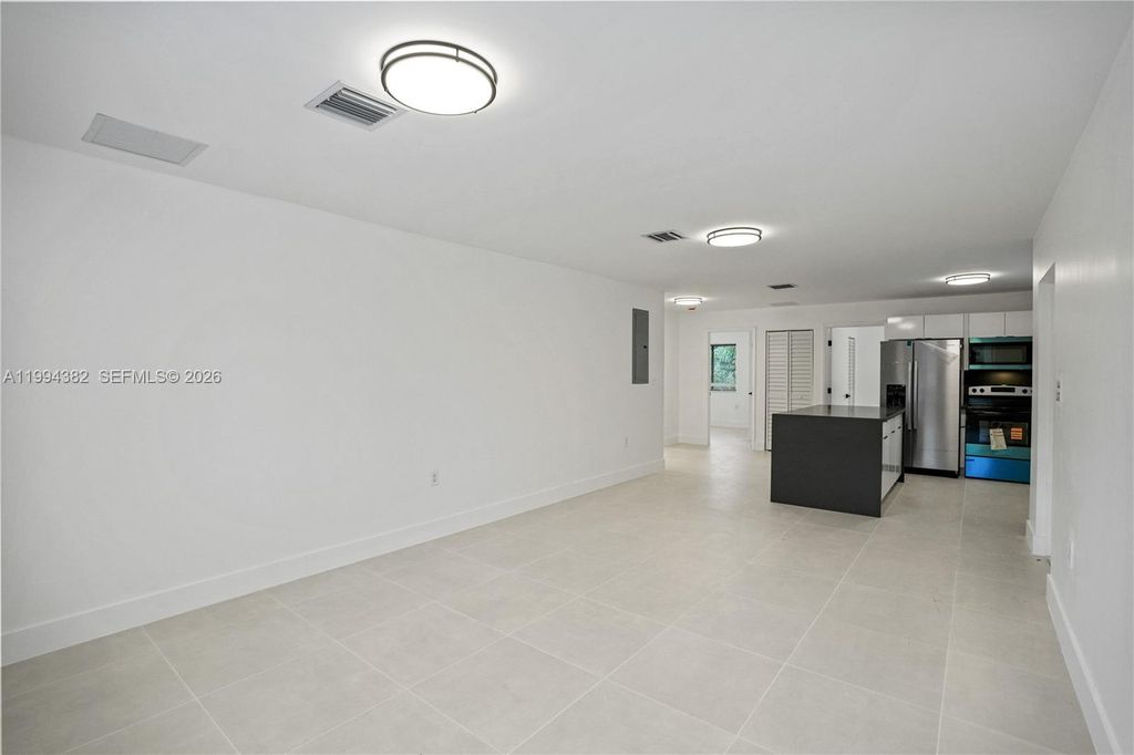 Photo of 5823 NW 30th Ave #5823, Miami, FL 33142 (MLS # A11994382)