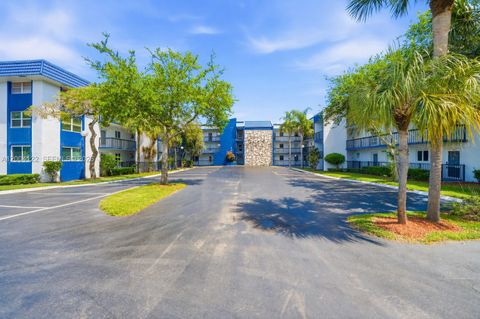 Photo of 3190 Holiday Springs Blvd #4-306, Margate, FL 33063 (MLS # A12004122)