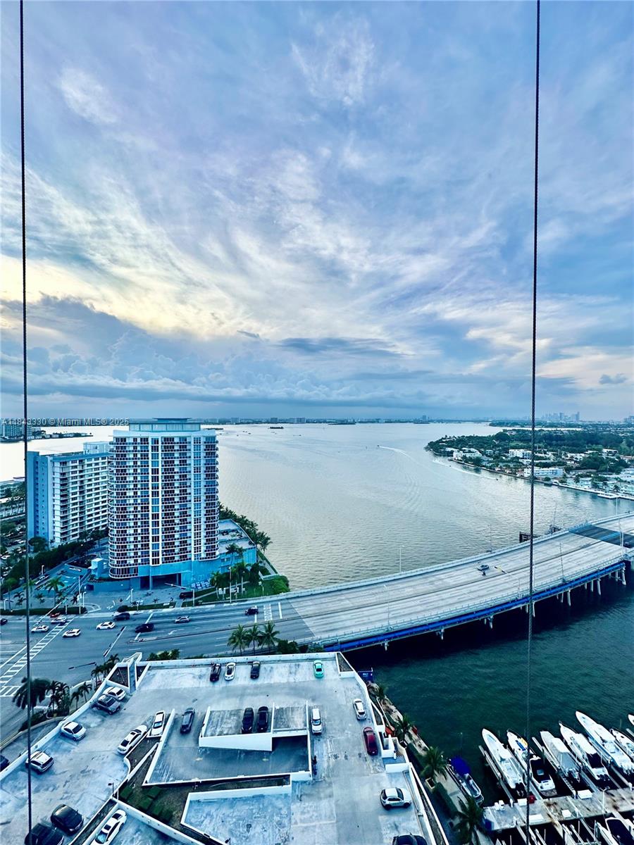 Stunning Location with a wonderful water views of the Biscayne Bay, Miami Beach and Downtown Skyline.
This magnificent condo featuring 2 Beds and 2 Baths with floor to ceiling glass windows in all angles to enjoy the views. Expansive private balcony providing natural lighting and breathtaking sunset views. The building provides variety of amenities including 24-hour security, an attended lobby, pool, fitness center, marina, Cafeteria, mini market, barbershops located near beaches and tasteful restaurants, also near Miami Beach, Downtown Miami and airports. 1 parking space assigned with the option of extra parking through HOA.