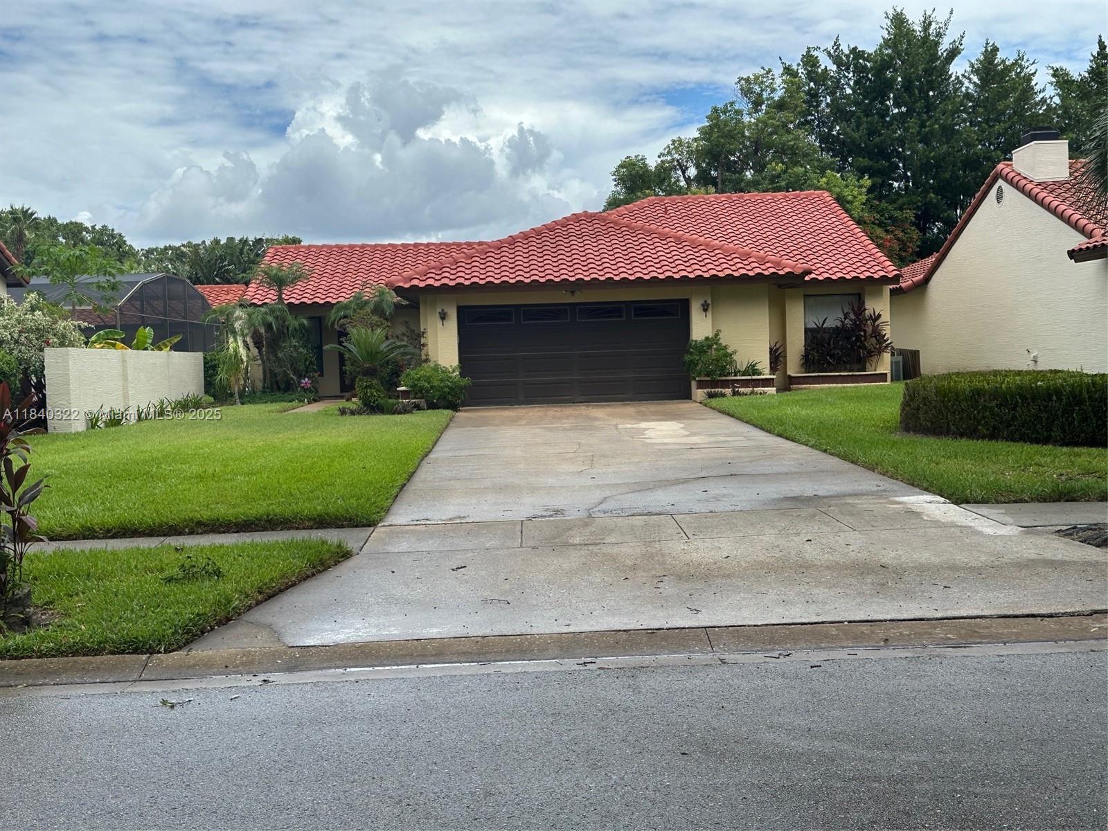 Charming 3-bedroom, 2-bathroom beauty nestled in a highly sought-after Orlando neighborhood of Granada Villas centrally located to many amenities. Located off a picturesque road with fully mature trees lining both sides. This lovely single-story residence offers timeless curb appeal and a 2-car garage with large driveway that defines Florida Mediterranean style. Beautifully landscaped entry welcomes you to your new home. Inside you will find high ceilings, spacious bedrooms and common spaces. Granada Villas features a private park and Little Sand Lake waterfront with a community dock for residents to enjoy and includes tennis courts. Near to fabulous shopping, spectacular dining, top-rated schools, parks, and major highways.