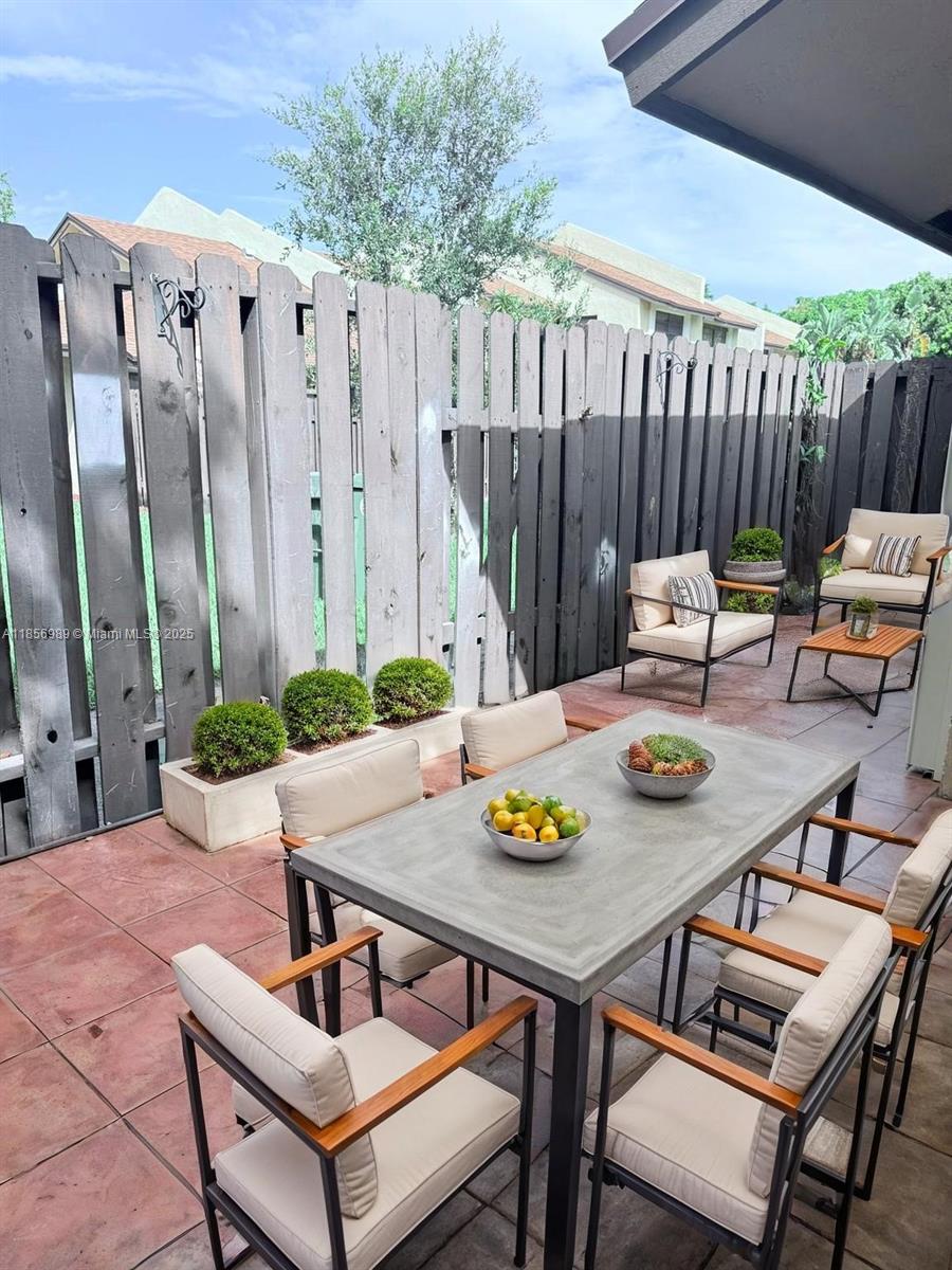 Welcome home to this pristine 2-bedroom, 2-bath corner townhouse in the desirable Tanglewood community! Enjoy a stylish kitchen with granite countertops, updated vanity bathrooms, and tile flooring throughout. This home includes all appliances—stove, microwave, refrigerator, dishwasher, and washer/dryer combo—plus two assigned parking spaces. Nestled in a quiet, well-kept community with a refreshing pool, this property offers both comfort and convenience in a prime location. Schedule your showing today!