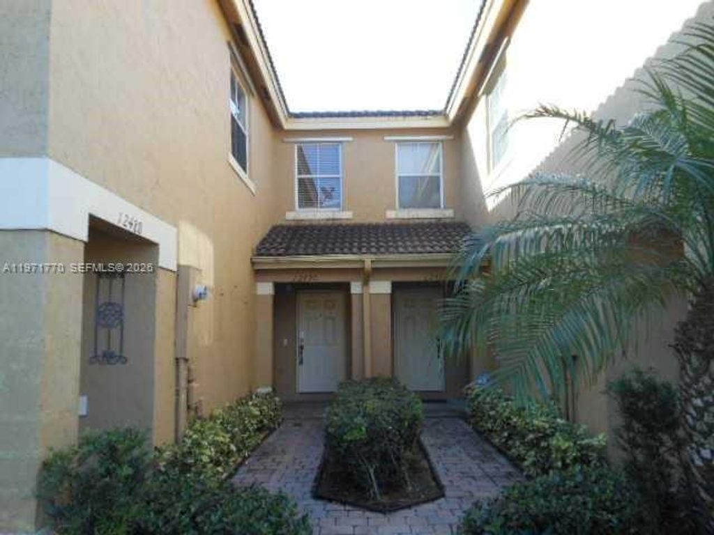 Photo of 12490 SW 54th St #12490, Miramar, FL 33027 (MLS # A11971770)