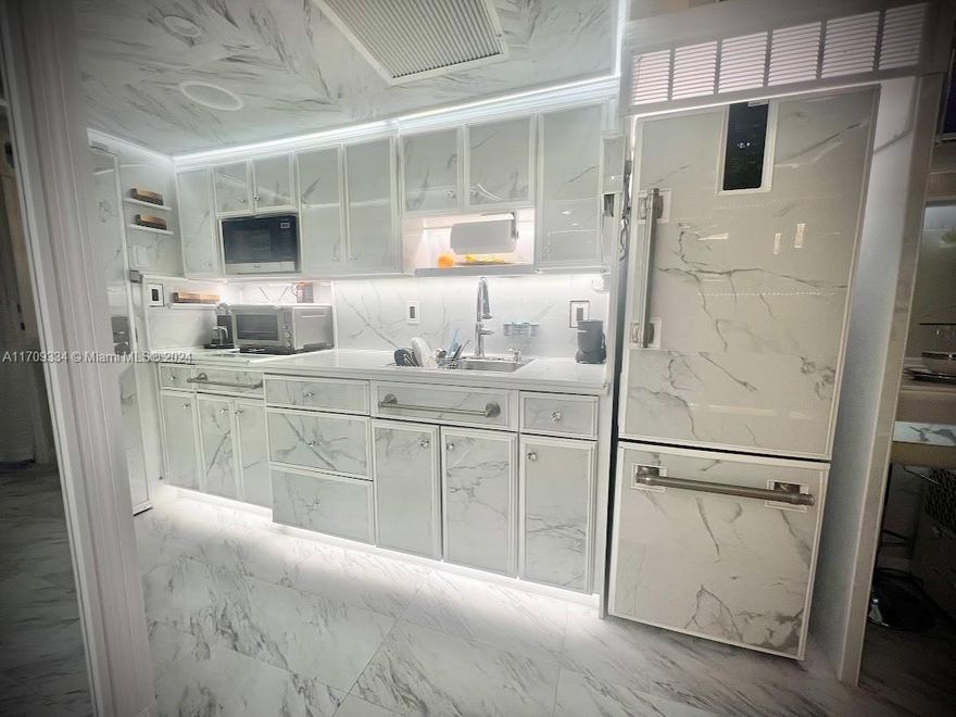Converted one bedroom design. Can be used as AirBnB-Rental - or Use as your residence Offered fully furnished with tons of upgrades, this one-of-a-kind residence brings Resort Lifestyle living to life. Breathtaking Atlantic ocean view residence directly on the beach in the highly sought after city of Sunny Isles Beach. Featuring in unit views of the Atlantic ocean through hurricane-impact glass picture windows and floor-to-ceiling Carrara marble walls and more. This condo has  elegant moldings, accent lighting and trim and a custom dining area. The galley kitchen offers plenty of room to entertain guests including two separate sleeping areas with lots of storage with a custom closet. 24 hour Valet parking service and one permanent parking space is included.