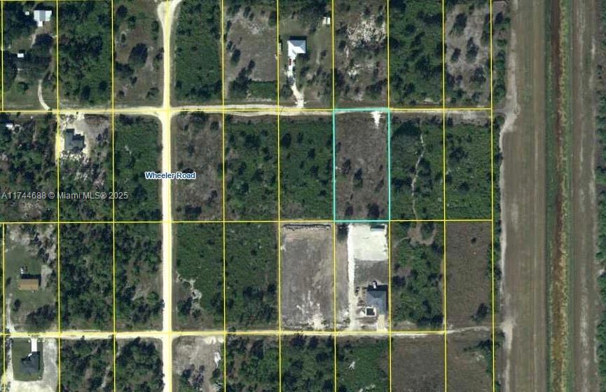 Nestled in the tranquil countryside of LaBelle, this expansive vacant lot offers an exceptional opportunity to build your dream home in a serene, private setting. Spanning approximately 1.25 acres, this property is located on a quiet, private street, providing a peaceful retreat while remaining just a short drive from Fort Myers and Lehigh Acres for convenient access to shopping, dining, and essential services. This undeveloped parcel offers a blank canvas for your dream home, private retreat, or investment property. With excellent connectivity to Fort Myers and its vibrant culture, this property is a rare opportunity to build and enjoy the Florida lifestyle.