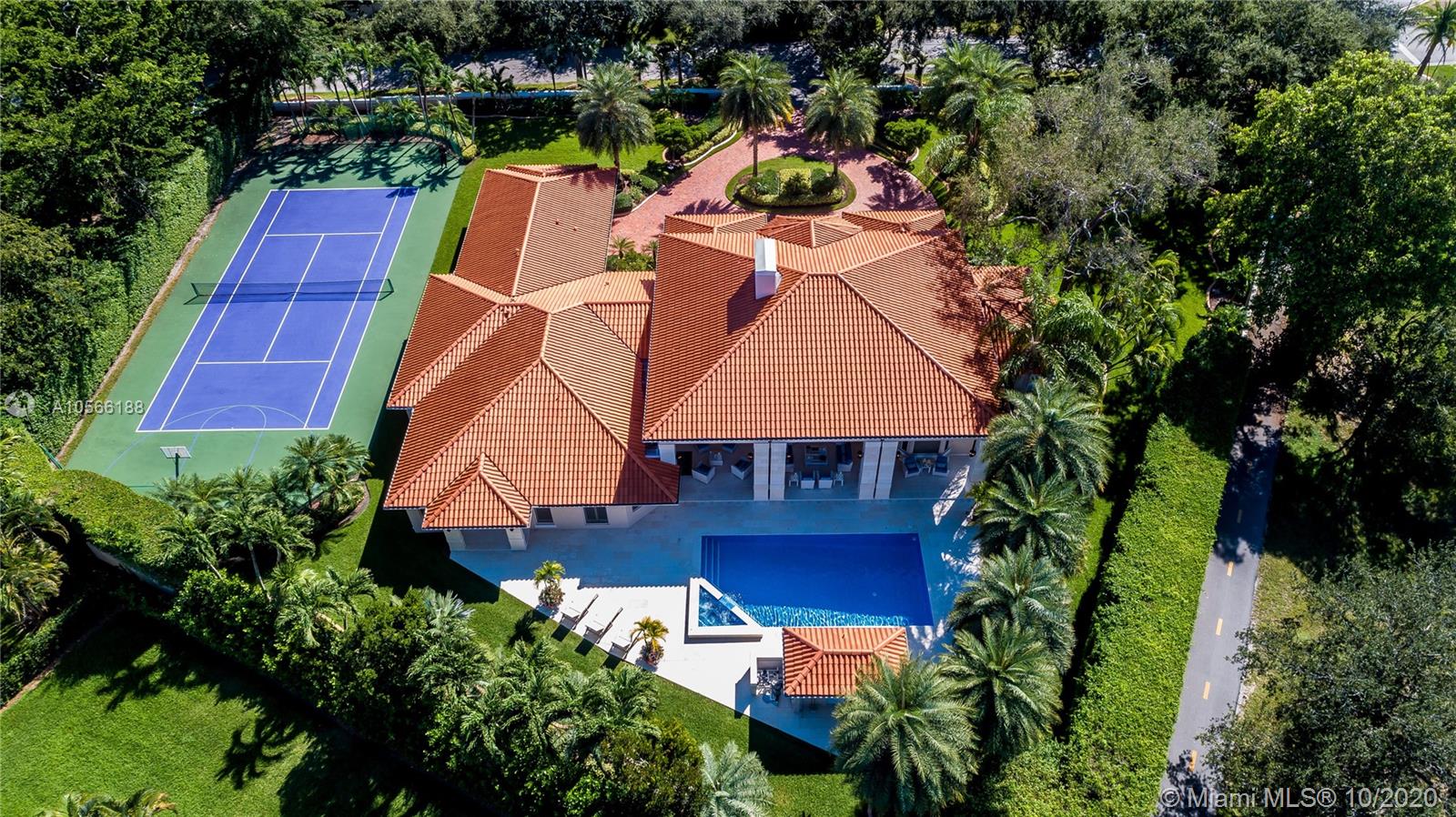 Immaculate, Prestigious Luxury. Every detail is perfectly executed in this 1-acre, guard-patrolled residence at the gateway to Gables Estates. Exquisite interiors encompass large social areas incl. elegant living & dining rooms plus a gourmet kitchen that opens to a chic family room with a built-in bar. Lovely pool & garden views are the backdrop to every room. The master suite has custom closets, a dressing area & an opulent marble bath w/infinity tub. The outdoors is an oasis custom-designed for Miami's year-round sunny enjoyment. Highlights incl. the artfully landscaped illuminated yard, wide covered terraces, swimming pool w/spa, alfresco kitchen & a cabana bath. Additional features incl. a hybrid tennis/basketball court, staff quarters & a garage. Connect with us to arrange a showing!