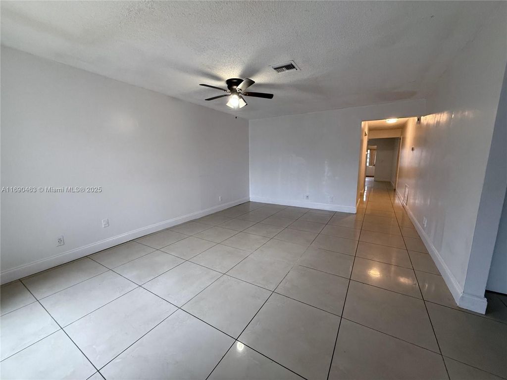 Photo of 11001 NW 44th St #EAST, Coral Springs, FL 33065 (MLS # A11690463)