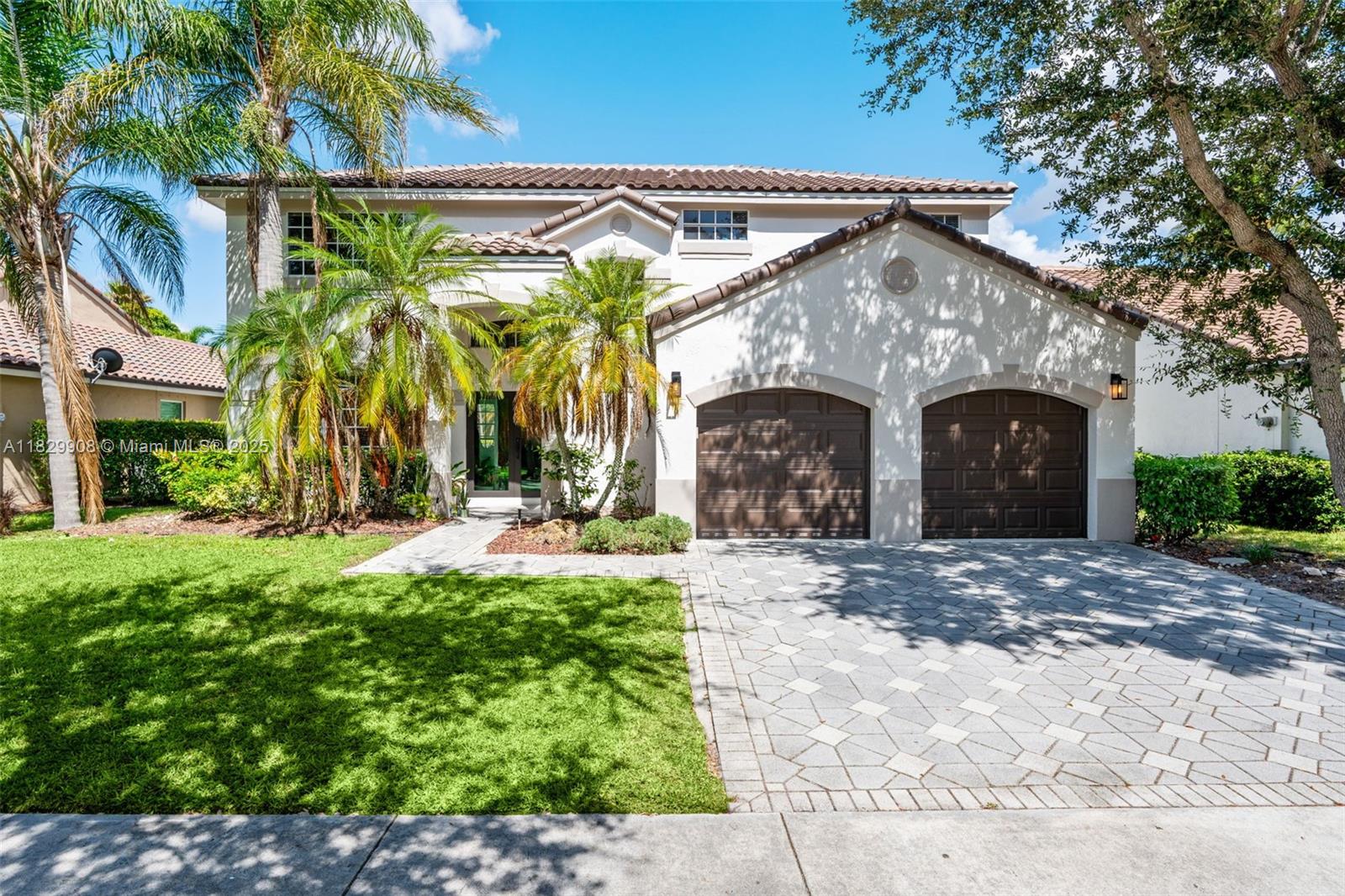 Come see this beautiful pool home located in the desirable gated community of The Lakes in Weston. This spacious residence features 5 bedrooms, 2.5 bathrooms, and a two-car garage. The oversized primary suite offers a cozy sitting area and 2 large walk-in closets, with a tastefully renovated en-suite bathroom. Downstairs, the 5th bedroom is currently being used as a den/office. New roof, new upstairs flooring, impact front & garage doors and updated lighting. Updated kitchen with granite countertops & stainless steel appliances. Equipped with two AC units. Step outside to a spacious, fully fenced backyard with a pristine pool and plenty of room to entertain. Zoned for A-rated schools and conveniently located near major highways, shopping and dining. Low HOA fee.
