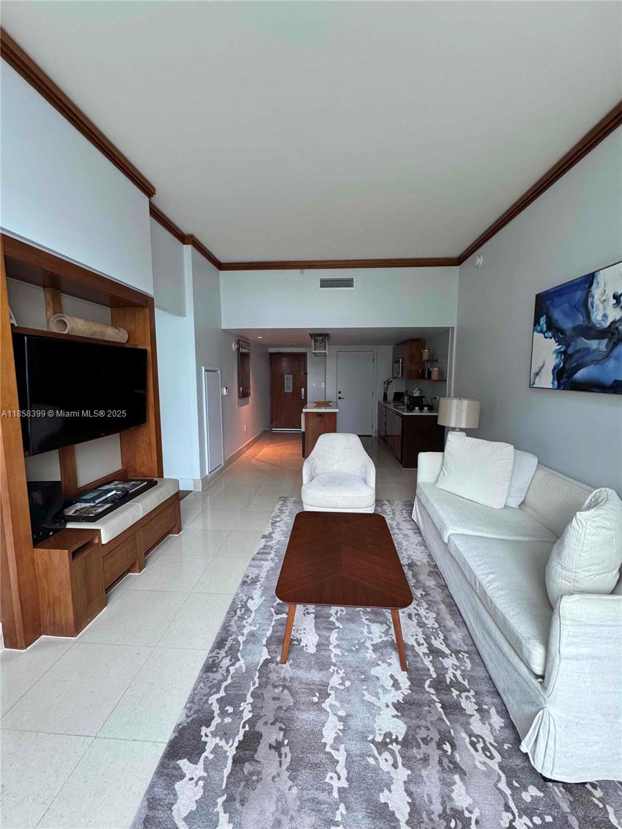Delight in breathtaking sunrise and ocean views from this spacious one-bedroom at the Carillon Wellness Resort and Spa. Live your best life at the Carillon, with top notch amenities, over 20 health classes daily, 4 pools, 3 dining venues, over 30,000 SF of gym/spa areas, beach service, salon, boutique, wellness staff, 6 acres of lush ocean front oasis, and more. Conveniently located walking distance from local restaurants, Publix, and major banks. This is beach front resort living at its finest!