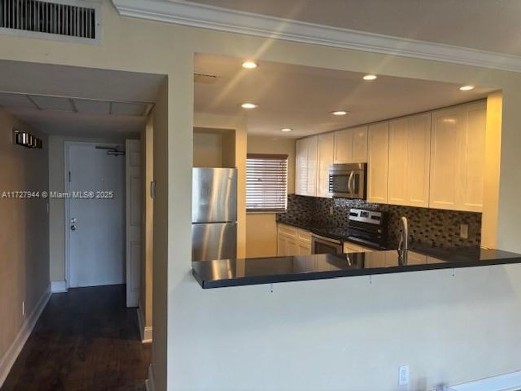 Photo of 9235 Lagoon Place #214, Davie, FL 33324 (MLS # A11727944)