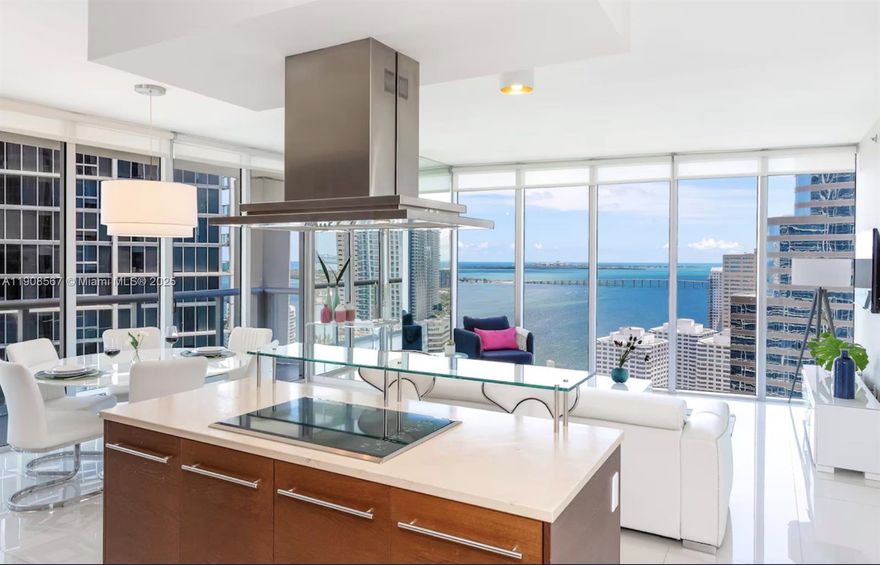 PRICED TO SELL! Located in the best line of the building, this spacious 2-bed, 2-bath condo offers breathtaking views of the Miami River, Biscayne Bay, and city skyline through floor-to-ceiling windows. The building is renowned for its ultra-modern aesthetic and five-star amenities. Inside, enjoy an open kitchen with Sub-Zero & Wolf appliances, Italian cabinetry, and elegant finishes throughout. Enjoy resort-style living with access to one of the largest residential pools in Florida, a 28,000 sq ft full-service spa, fitness center, valet, concierge, and on-site restaurants. Located in the heart of Brickell, you’re just steps from Brickell City Centre, Whole Foods, the MetroMover, and Miami’s top dining, shopping, and nightlife. ? Short-term rentals allowed. Great for investors