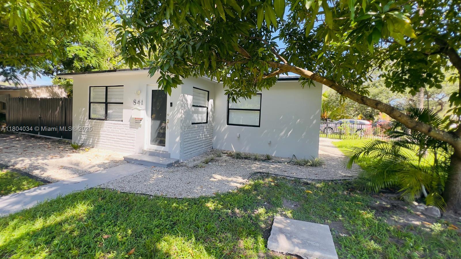 Fully remodeled 2/1 home with huge yard and private parking - includes: washer/dryer, new a/c, appliances, porcelain tile, impact windows, built-out closets, white kitchen cabinets, storage, zebra window shades, modern light fixtures etc. Corner lot with ample front and backyard, fruit trees and shaded area perfect for entertaining. Rent includes water/sewer, electricity, internet and monthly landscaping. Close to Hollywood circle, less than 3 miles from the beach. Pets OK. On Lockbox, EASY TO SHOW!