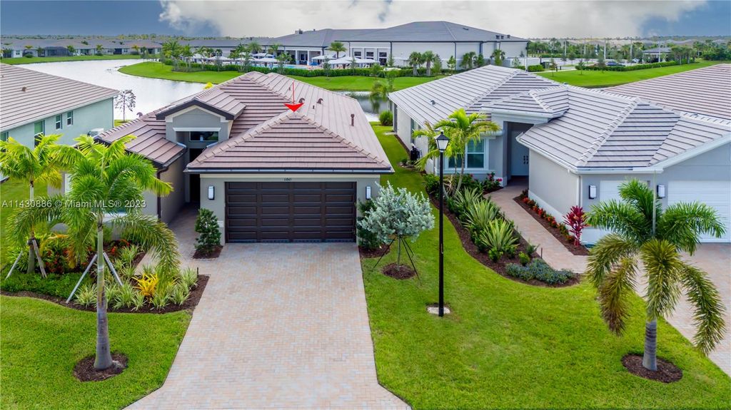 Photo of 11845 SW Poseidon Way, Port Saint Lucie, FL 34987 (MLS # A11430886)