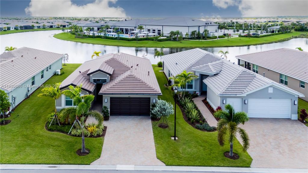 Photo of 11845 SW Poseidon Way, Port Saint Lucie, FL 34987 (MLS # A11430886)