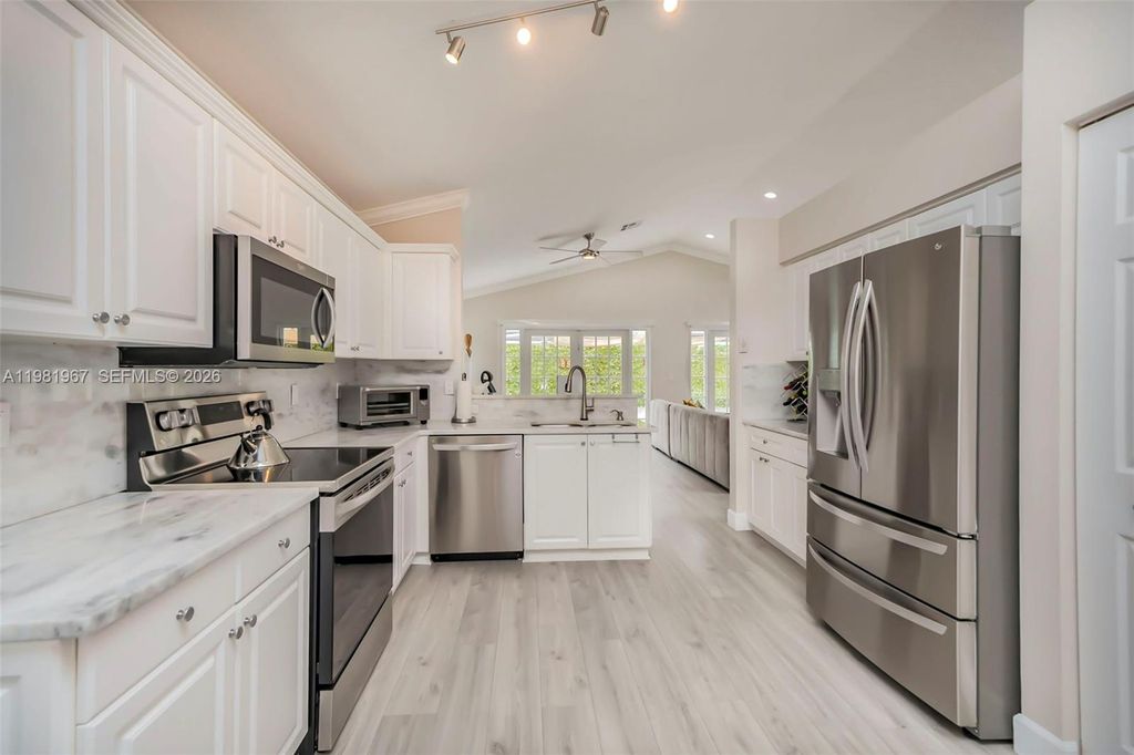 Photo of 11030 Harbour Springs Cir #11030, Boca Raton, FL 33428 (MLS # A11981967)