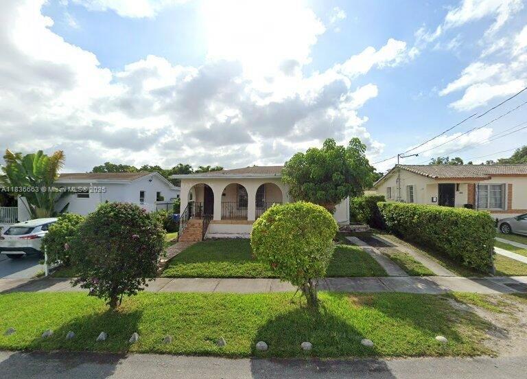 Location! Location!! Location!!! This fantastic 2 bedroom 1 bath home sits in a quiet residential neighborhood in the heart of Miami! The pride of ownership truly shows in this lovingly maintained home. The interior offers nearly 1,350 square feet of living space and the home sits on a 5,000 square foot lot. Spacious family room overlooks the lush backyard. Utility room with washer and dryer included. Roof is only 1 years old so no issues getting insurance.