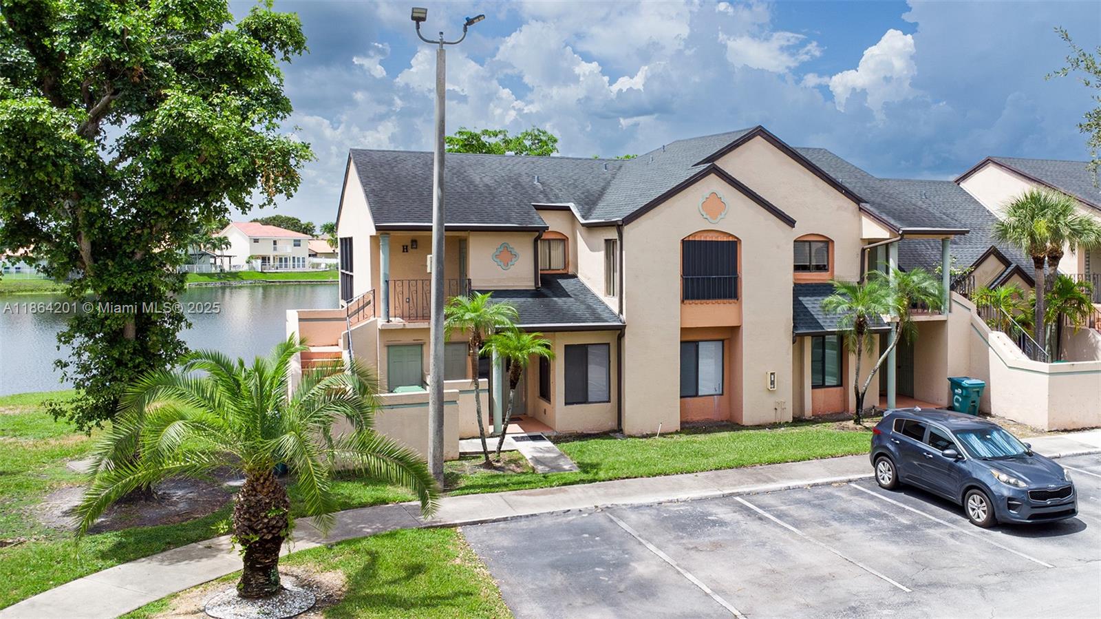 Don’t miss this GEM in the Miami Lakes area! Spacious 3/2 first-floor townhouse located directly on the lake with breathtaking sunset views. Enjoy panoramic lake views from the kitchen and living area, filling the home with natural light and serenity. The property features a beautifully remodeled kitchen with upgraded appliances, open living spaces, and a charming sitting area perfect for entertaining or relaxing. Roof and AC is less then 5 years old. Storage space in the outside area. Parking in the front of the unit and plenty of parking available throughout. A rare find in a highly sought-after area!