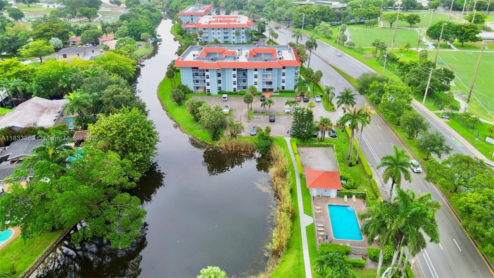 Location, Location! Amazing opportunity to own a 2/2 corner unit in the heart of Plantation. Located on the 4th floor with peaceful garden views, this bright and updated unit features a split floor plan, tile in main areas, and laminate in bedrooms. Secure, well-maintained building with new roof and low HOA. Investor-friendly—rent from day one! Currently leased until Feb 2026 at $2,050/month. Amenities include a pool, laundry facilities, and more. Near 595, shopping, dining, parks & more. Structural Safety Report, Application, Budget & Wind Mitigation available in MLS attachments or upon request.