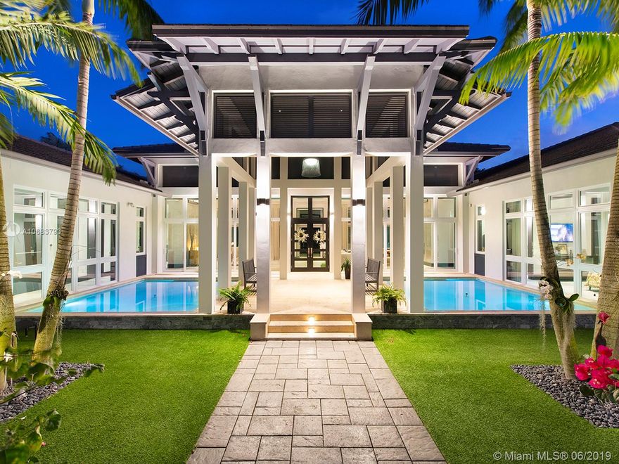 Tropical Oasis! The ultimate resort sanctuary! Superb, unique and artistic architectural design. Unique, exquisite with finest finishes! Stunning 24' soaring ceiling, luxurious designer flooring. Features stone, marble, and tile. Unparalleled quality with sleek modern and elegant elements throughout. Gorgeous and open vistas with every turn! Great floor plan. Fabulous gourmet chef's kitchen. Lavish master suite with sumptuous bath! Magnificent lush grounds with professional landscaping and Feng-Sui water features! Extraordinary blending indoor-outdoor living. Spectacular outdoor entertaining with inviting large heated pool, a fire-pit sitting area equipped with complete cabana and summer kitchen! Putting greens and much more! Truly one of a kind! Sensational!!