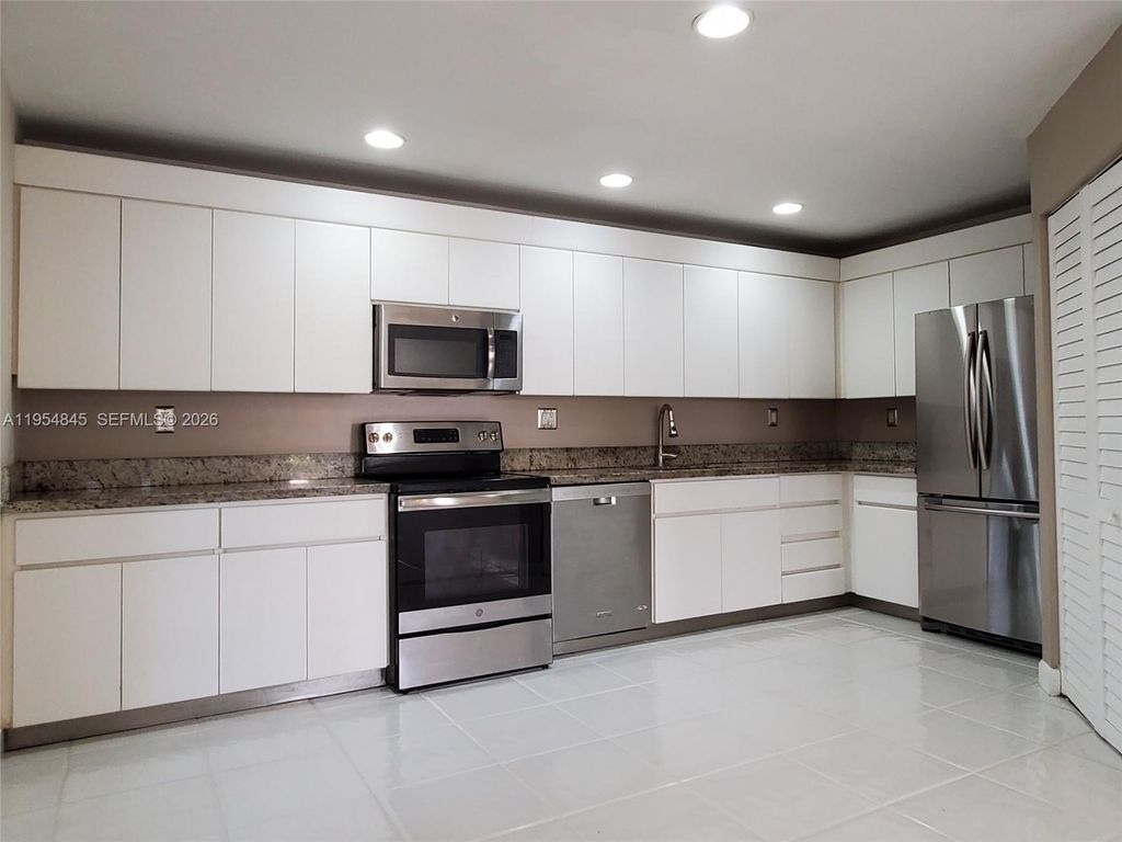 Photo of 561 Racquet Club Rd #24, Weston, FL 33326 (MLS # A11954845)