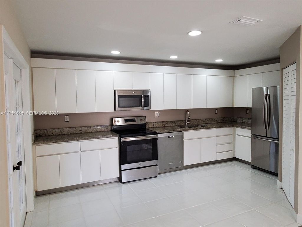 Photo of 561 Racquet Club Rd #24, Weston, FL 33326 (MLS # A11954845)