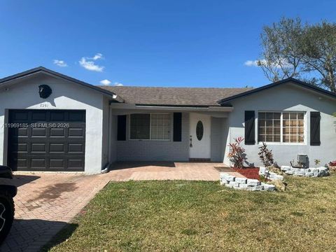 Photo of 8201 NW 105th Ave, Tamarac, FL 33321 (MLS # A11969185)