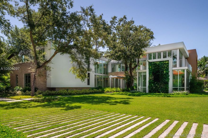 Situated on a gated estate with a lush canopy of large live oaks, this sophisticated new construction in the exclusive Ponce-Davis neighborhood boasts 7,916 sq. ft.of luxe living with 6 bdrms/6.5 baths,and additional multi-use spaces suitable for office,media room,additional bedrooms,or maid’s quarters. Architectural gem lead by architects O’Donnell Dannwolf & Partners,this stunning home features a SieMatic eat-in kitchen with top of the line apls.Vertical gardens enhance the spacious 34,408 sq.ft. lot highlighted by an infinity pool.A cabana and outdoor kitchen offer unlimited entertaining options.Other amenities include a fitness rm,walk-in closets,3-car garage,stone and wood flooring,central vac, gas range and water heater,high-tech sound /security throughout.