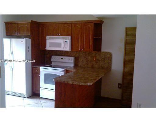 DORAL COURT CONDO - Residential Lease