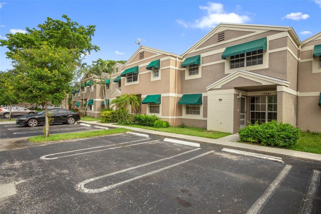 Photo of 12261 Lake Loop Rd, Cooper City, FL 33330 (MLS # A11974013)