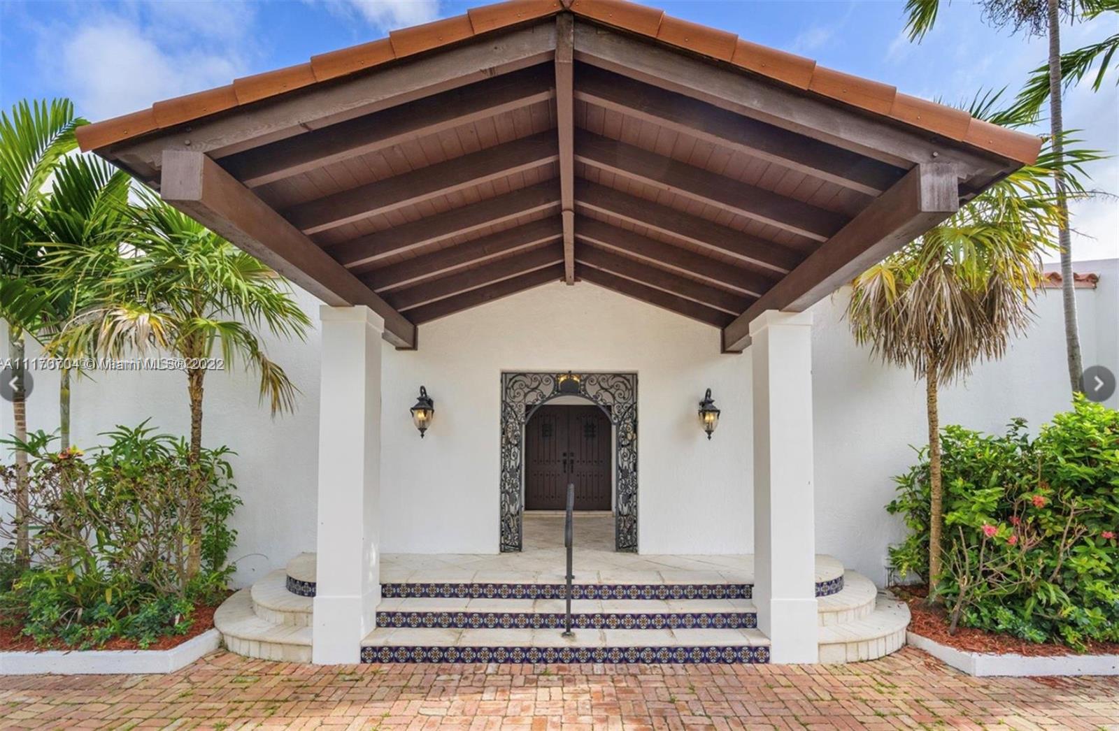 Unique Spanish style home located on coveted Mashta Island. This 5 Bedroom, 5 1/2 bathroom home includes vaulted ceilings, two gorgeous courtyards, and elevator. You can find beautiful marble throughout as well as a custom gourmet kitchen including a “La CornueFe” dual gas range w/ custom hand-made French country style hood & bespoke Italian wood cabinets w/ Bronze tinted glass. Upstairs, the primary suite is appointed w/ herringbone wood floors, an owner’s lounge & a stunning 400ft terrace. The primary bathroom is finished with marble walls, 24k gold tile and free-standing tub. Standout features include a wellness & fitness area w/ spa & sauna, fully equipped gym, 250-inch tv wall, and a Billiard Room terrace. In the garden you’ll find a solar-heated pool, summer kitchen, BBQ & fire-pit.
