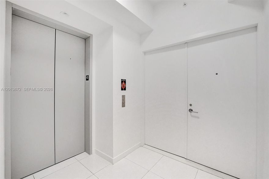 Enjoy this luxurious 3 bed, 4 bath plus den corner residence in the sky. Enter through a semi-private elevator into your private foyer and step into an expansive ~2,200 sqft home featuring a unique, upgraded floor plan where the entry door is positioned closer to the elevator—enhancing and enlarging the main living space for a more open, grand feel. A rare offering, the residence includes three parking spaces (two assigned and one valet) as well as a private storage unit.

The home offers spectacular northeast views of the bay and city, complemented by custom-built walk-in closets, sheer curtains with blackout shades, and upgraded recessed lighting throughout. The den remains open and seamlessly integrated into the layout, ideal as a flexible living, office, or media space.

The chef’s kitchen is outfitted with Sub-Zero and Wolf appliances. Located at Paramount Miami Worldcenter, residents enjoy one of the most amenity-rich buildings in the world, including virtual golf, five resort-style pools, yoga and recording studios, basketball court, spa, state-of-the-art fitness center with boxing area, BBQ kitchen, racquetball, kids’ play area, tennis courts, and a skydeck observatory with telescopes. Steps from the Metromover and surrounded by Miami’s premier dining, shopping, and entertainment.