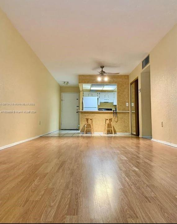 **No Rental Restrictions**.  Tenant occupied until October 1st. Laminate flooring/tile, new windows, open balcony. Community pool, hot tub, sauna, tennis courts, gym. Centrally located in Plantation, near all major schools and shopping centers. Maintenance includes water, trash, roof maintenance, outside maintenance, insurance, laundry facilities. 2 laundry rooms on each floor. Full reserves, no special assessments, 40 year inspection passed.
