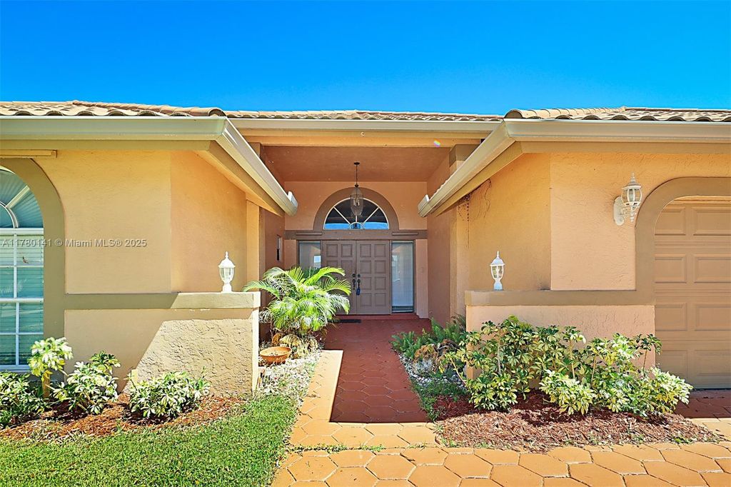 Photo of 9677 N Springs Way, Coral Springs, FL 33076 (MLS # A11780141)