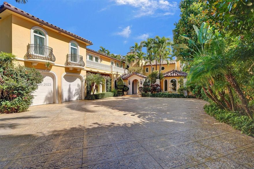 Escape To Your Private Gated Italian Villa Located on Prestigious Pine Tree Dr.