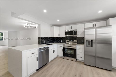Photo of 441 NE 195th St #302, Miami, FL 33179 (MLS # A12108115)
